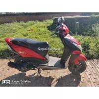 Honda dio on sale single handed