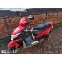 Honda dio on sale single handed